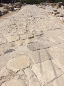 The grooves that you see in the stones are from carts going down the street.